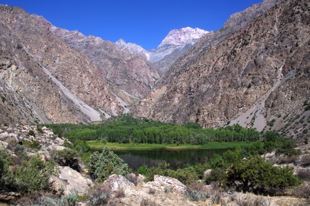 Green island in mountains - forest, mountains, rocks, island, beautiful, splendor