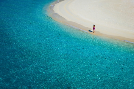 Walking by the Blue Sea... - lady, hat, beautiful, walking, clear, blue sea