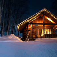 Winter Cabin at Night