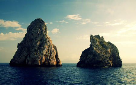 Caves in the ocean - caves, water, scenery, blue, landscape, ocean, sky