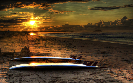 Simply Beautiful - surf, summer, sunbeams, beautiful, beach, amazing, ocean, surfing, golden sunset, view, golden, ocean waves, nature, sunset, summer time, rays, beauty, peaceful, sky, sand, sunrays, sunlight, clouds, people, lovely, splendor, sea, sunrise, waves