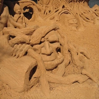 Sand Face in Tree Roots