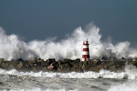 Storm over the Beacon - lighthouse, ocean, varzim, povoa, light, harbor, do, storm, waves, portugal, house, sea