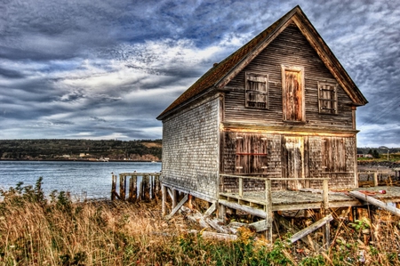 Old Fishing House - clouds, shore, lake, deck, brush, fish house