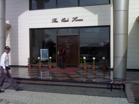 Entrance to the Golf Club House. - golfer, entrance, building, glass