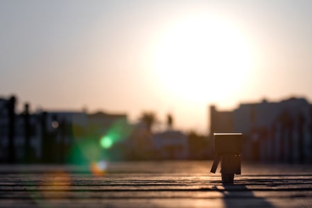 Danbo takes a walk - danbo, egypt, walk, sun, lensflares, sunset, bridge