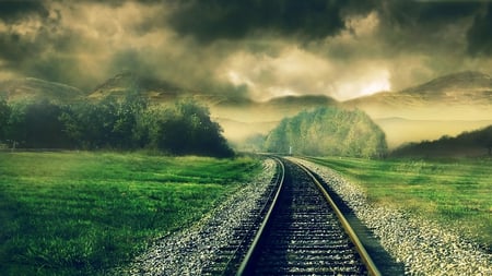 Leaving - fields, sky, trees, rails, hills, mountains, storm, train tracks, railroad, clouds, fog, stormy, grass