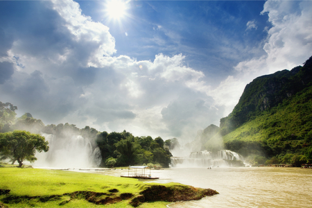 Little Paradise - nice, sky, trees, paradise, sun, water, mountains, meadow, wonderful, waterfall, little paradise, amazing, pretty, clouds, tree, boat, hill, lake, sunlight, hills, waterfalls, stunning, outstanding, heaven, beautiful, awesome, grassland, sea