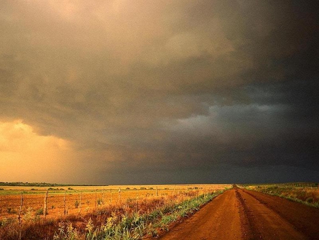 Something Brewing - road, clouds, field, forces