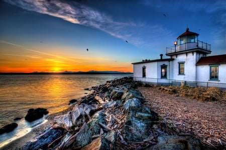 Seaside Lighthouse - sunset, lighthouse, sea, ocean, rocks, sky