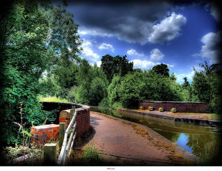 Bricked Bridge Walkway - trees, water, bricks, blue, green, landscape, sky