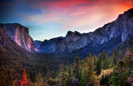 sunset across the mountains - color full sky, trees, sun, breathtaking  sunset, light, sunset, mountains, blue mountains, forest, bright sun, blue light