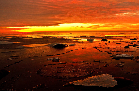 Infinity.. - beauty, sky, sun, water, image, sunset, fire, rocks, amazing, clouds, golden, background, winter, shore, nature, picture, beautiful, awesome, infinity