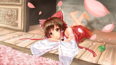 hakurei reimu - hair ribbon, cap, brown eyes, solo, kawai, brown hair, touhou, wide image, petals, anime, highres, lying, girl, long hair, hair bow, hakurei reimu, bow, japanese clothes, dress