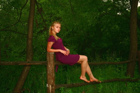 Lady in Purple - beautiful, dress, beauty, fence, nature, pony tail, purple, green, sitting