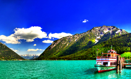 Lovely View - sky, trees, sailboats, water, mountains, clouds, green, tree, sunny, house, boat, houses, lake, landscape, boats, sailing, nature, village, pier, sailboat