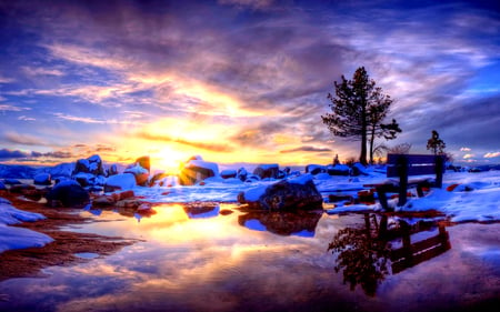 Winter Splendor - amazing, splendor, landscape, snow, sunrise, reflection, sunrays, winter splendor, purple, view, bench, lake, sky, sun, clouds, sunlight, trees, winter, water, beautiful, sunbeams, beauty, lovely, stones, tree, nature, sunset, winter time, rays, peaceful