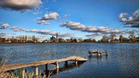 Severed Lake Bridge - sky, lake, landscape, town, clouds, blue, bridge