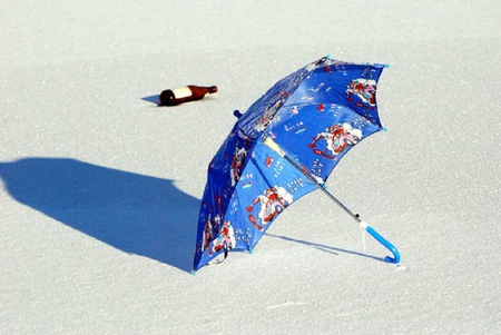 Left in the sunshine - sands, bottle, umbrella, blue