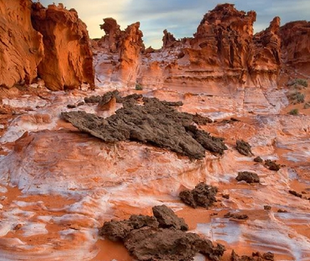 Flowing over smooth Canyon Rock - rock, water, canyon, sky