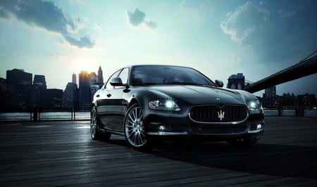 Maserati Quattroporte Sport GTS - cars, sunset, quattroporte, maserati, skyscrapers, skyline, city, maserati quattroporte, bridge