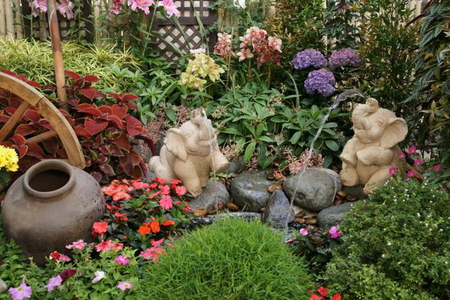 TROPICAL GARDEN - urn, flowers, elephants, wheel