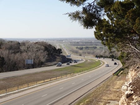 Overlooking the Highway - highway, trees, road, tree, sky