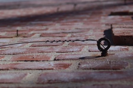 Nail in the Wall - outside, modern, brick, wall, nail, angle