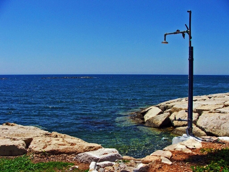 Shoreline Shower - shower, ocean, water, sky