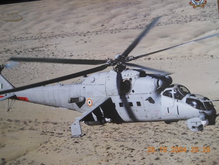 A Combat Helicopter Of The IAF> - ground, chopper, rotors, flight