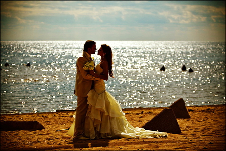 Love - wedding, kiss, beach, ocean, lovers, valentine, woman, water, love, bride, sun, sky, reflection, sunlight, clouds, sands, hug, sea, sunrise, sunshine, man