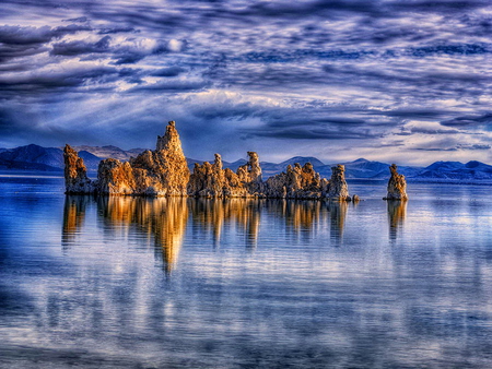 Solitary - calm, clouds, oceans, solitary, mirrored, sea, reflection, nature, peaceful, sky, rocks