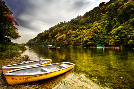 Boats for leisurely stroll - slope, lake, sky, boats, mountain, peaceful, water, mirrored, stroll, calm, nature, reflection, clouds, walk, river, leisure