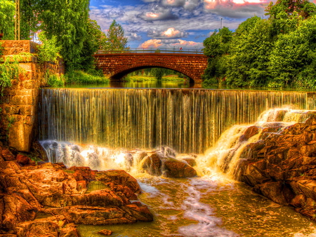 Waterfall in town - sky, trees, summer, waterfall, foam, nature, fall, town, clouds, beautiful, water stream, stones, old, bridge