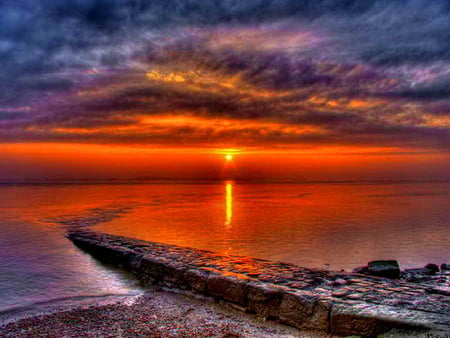 Beautiful sunset - clouds, sunlight, water, sundown, beach, sea, ocean, reflection, stones, shore, sunset, nature, red, pureple, sun, sky