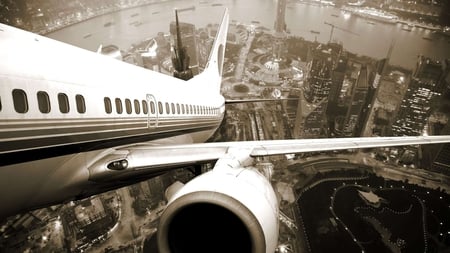 leaving the city - city, plane, grey scale, take off