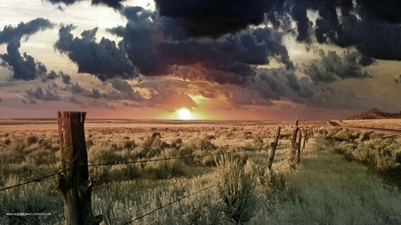 golden sunrise - fields, fence, black clouds, sunrise