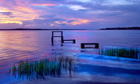 River sunset - photography, water, sunset, wood, reflections, art, evening, river, clouds, grass, ocean, boats, deck, plants, cape fear, pink, blue, sunrise