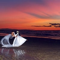 Cape Cod couple dip in sunset