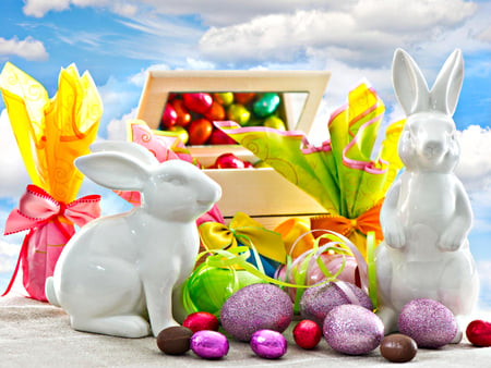 Easter - pretty, eggs, gifts, rabbits, spring, reflection, spring time, easter, mirror, ribbon, box, egg, sky, clouds, rabbit, beautiful, photography, chocolate, beauty, colors, lovely, still life, bunny, sweet, happy easter, colorful, nature, easter eggs, bunnies, gift, bow