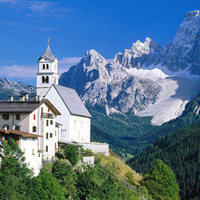 church by the dolomite mountains