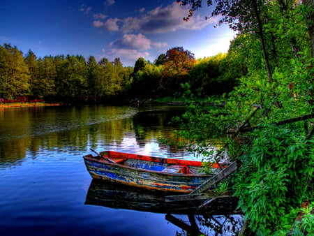 Boat in mirrored waters - lake, sky, trees, peaceful, summer, calm, nature, lonely, reflection, clouds, river, waters, pond, boat