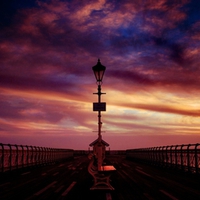 sunset off a pier